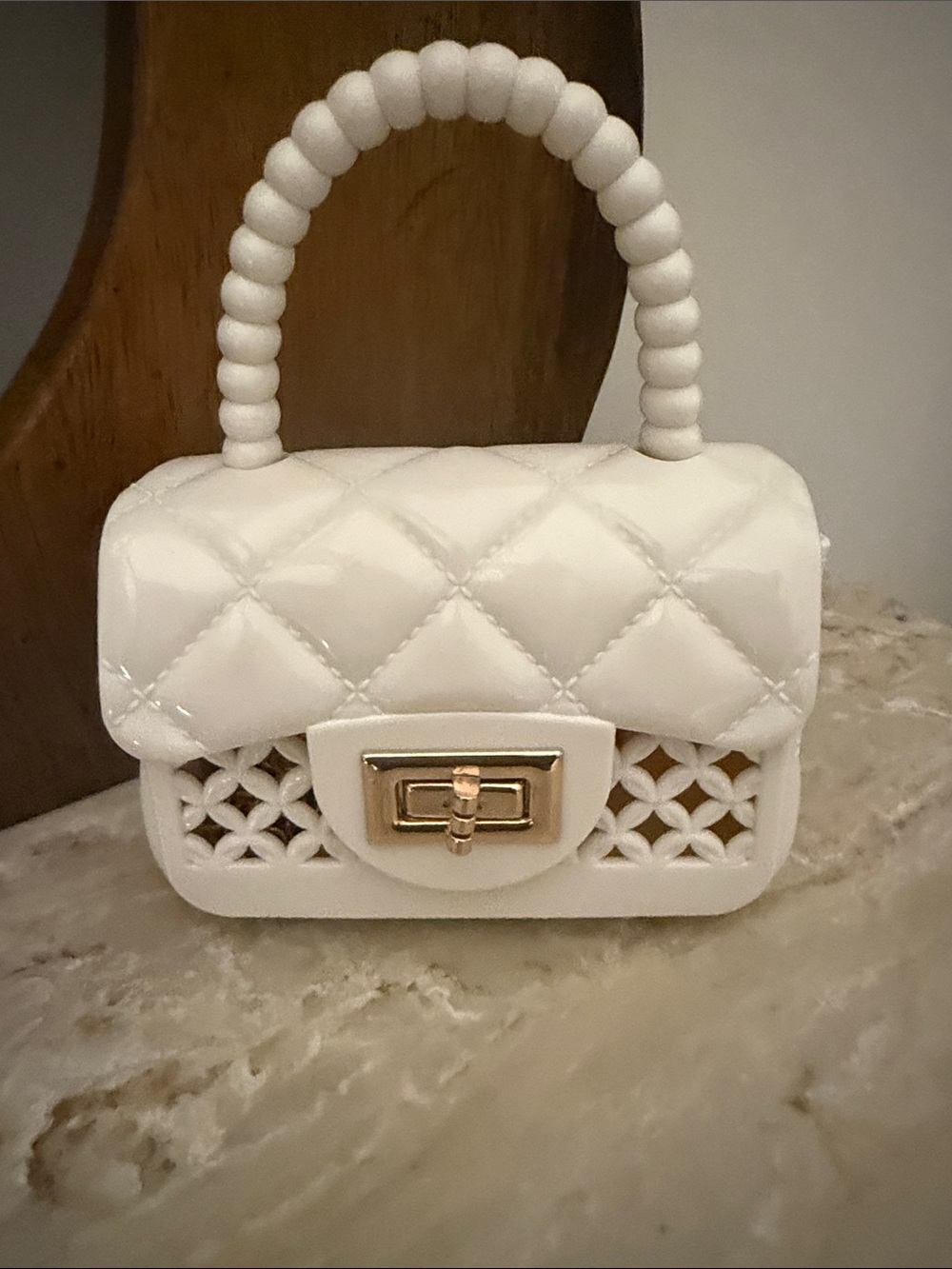 White Quilted Mini Top-Handle Bag with Gold-Tone Turn Lock